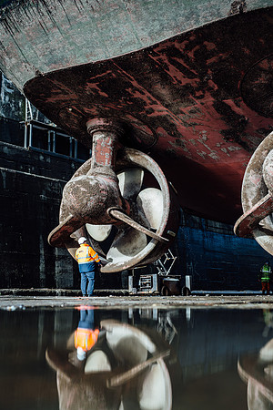 Tug boat engine being inspected - marine engineering