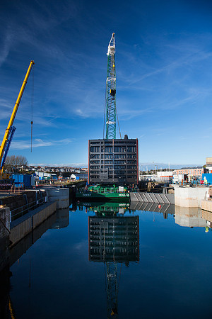 Lock gates being lowered at The Port of Milford Haven