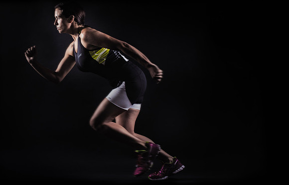 Ironman athlete running for studio photograph in Pembrokeshire