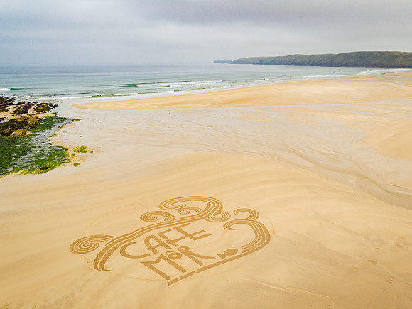 Aerial drone image of sand art for Cafe Mor at Freshwater West beach