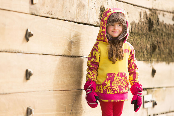 Child model wearing Isea clothing at the beach