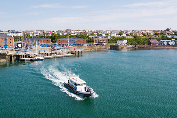 Coast & Cleddau sightseeing boat leaving Milford Haven marina