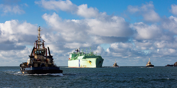 Oil tanker escorted by tugs into the Milford waterway