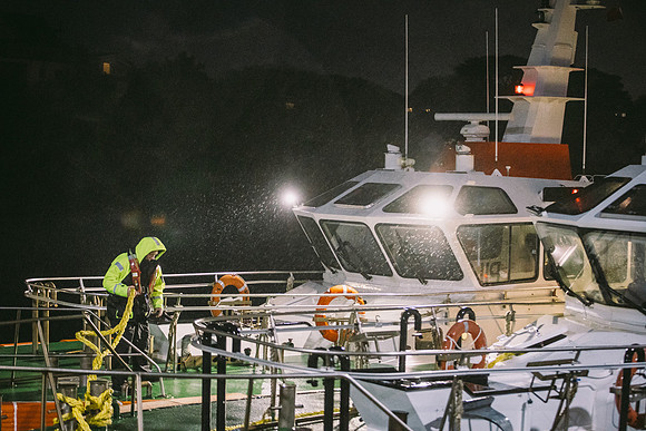 Photography of crew members working in harsh conditions
