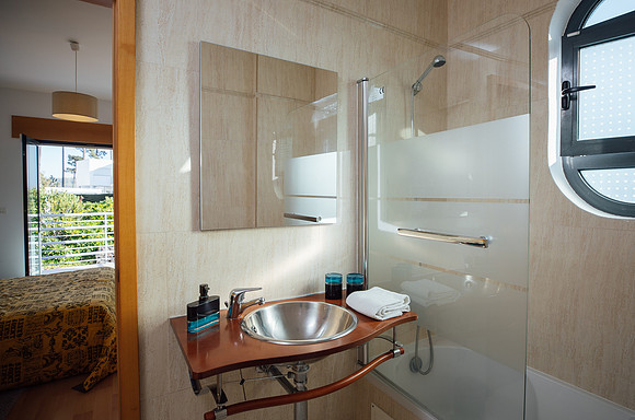 Beautifully lit clean and modern bathroom at holiday let