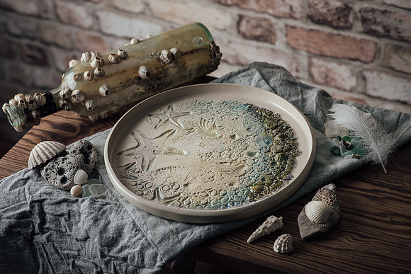 A textured plate photographed with studio lighting