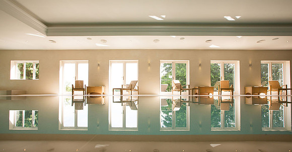 Reflections on the main swimming pool at Lamphey Court Hotel