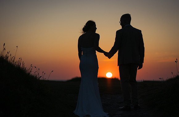 Silhouette of a couple on their wedding day