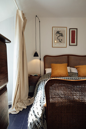 Stunning vintage bed beautifully made at Beacon Cottage Cornwall